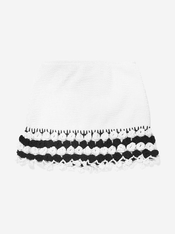 Nessi Byrd incorporate captivating materials into their everyday luxury swimwear. This girls Agave black girls skirt amplifies the New York label's passion for dynamic luxury and resortwear. Crafted with crochet accessories at the ends in a textured fabric and elasticated waistband. She will look and feel divine. Crochet Material 100% Cotton