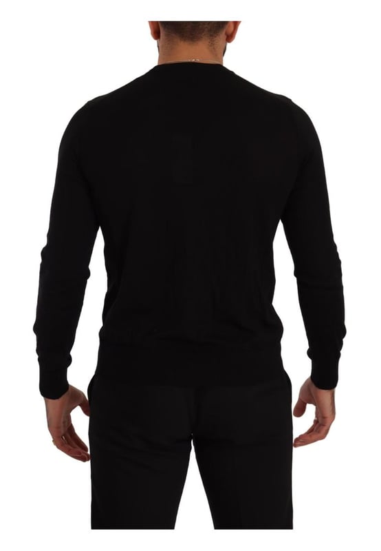 100% Authentic Dolce & Gabbana cashmere cardigan sweater
  Brand new with tags
  Button applique
  Straight cut
  Thick ribbed knit at the cuffs v-neckline and waistband
  Made in Italy
  Material: 100% Cashmere