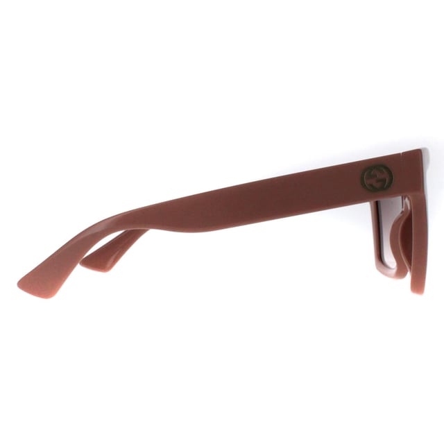 Gucci Square Womens Pink Brown Gradient GG1714S  Sunglasses are a masterful blend of modern sophistication and luxury, designed for those who appreciate bold fashion statements. With a distinctive, oversized frame featuring sleek, angular lines, these sunglasses add an edge to any look while maintaining an air of elegance. The iconic double-G logo on the temples underscores Gucci's legacy of impeccable craftsmanship and attention to detail. High-quality lenses offer excellent UV protection, ensuring comfort and safety under the sun. Available in an array of stylish colors, the GG1714S model is perfect for those looking to make a striking impression with an accessory that embodies both contemporary flair and timeless appeal.