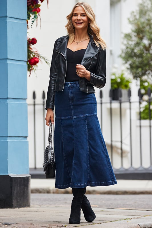 The skirt of the season
Made from our signature soft stretch denim
Statement panelled detail
Full flared hem for a standout silhouette
You'll wear it year-round
Add a knit and knee-high boots for the perfect autumn outfit