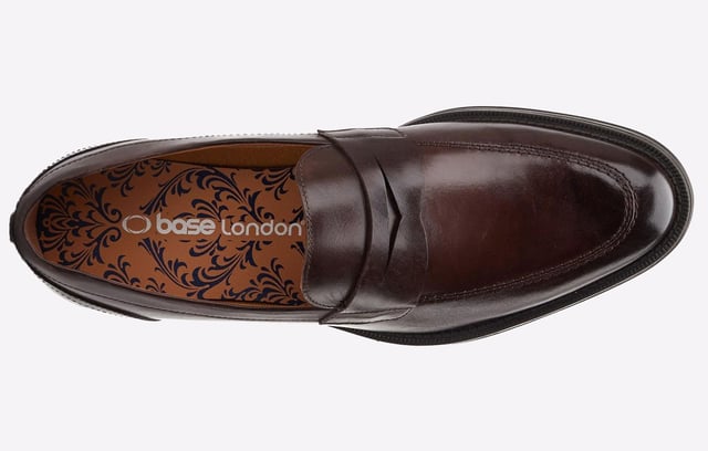 Base London Kennedy Loafers Mens Crafted from premium leather, the Kennedy penny loafers by Base London boast a simple yet refined design. The classic penny loafer strap across the vamp and a cushioned Ortholite insole ensure unmatched style and comfort.- Quality leather uppers- Slip on loafer design- Intricate stitch detailing- Ortholite Insole- Grippy Rubber Sole
