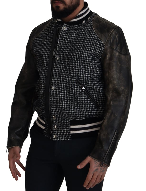 100% Authentic Dolce & Gabbana houndstooth jacket
  Exclusive and rare item from the MainLine collection
  Bomber jacket style
  Multicolor design
  Full zipper closure
  Logo details
  Made in Italy
  Material: 70% Polyester 30% Leather
  Lining: 100% Polyester
Material: 70% Polyester 30% Leather