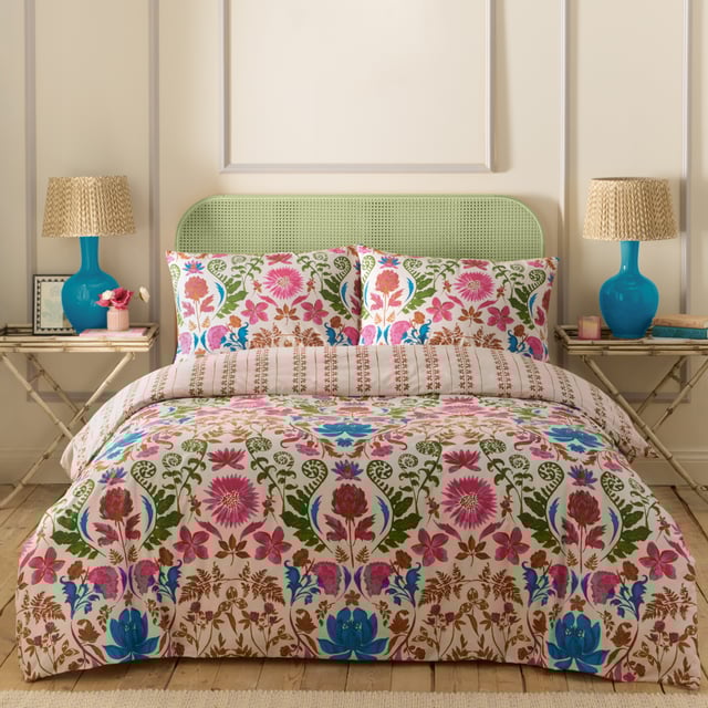 Inspired by the gardens of India, the Curious Lotus duvet cover set is filled with intriguing exotic florals and fauna. Bright pinks, cobalt blues, and warm pecans intertwine to create an eye-catching print. Complete with an intricate striped reverse, providing you with two distinct looks for a midweek refresh.