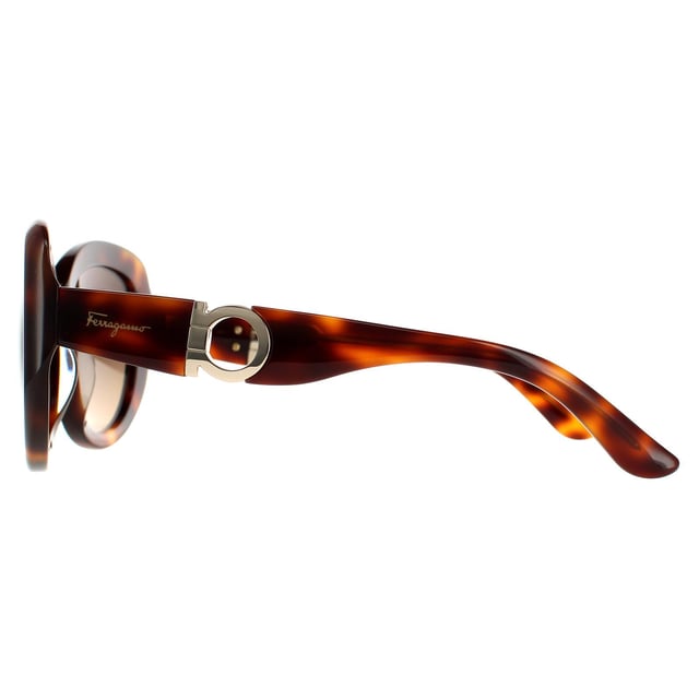 Salvatore Ferragamo Oval Womens Tortoise Brown Gradient Sunglasses SF727S are a modern oval style crafted from lightweight acetate. The Salvatore Ferragamo logo features on the temples for brand authenticity