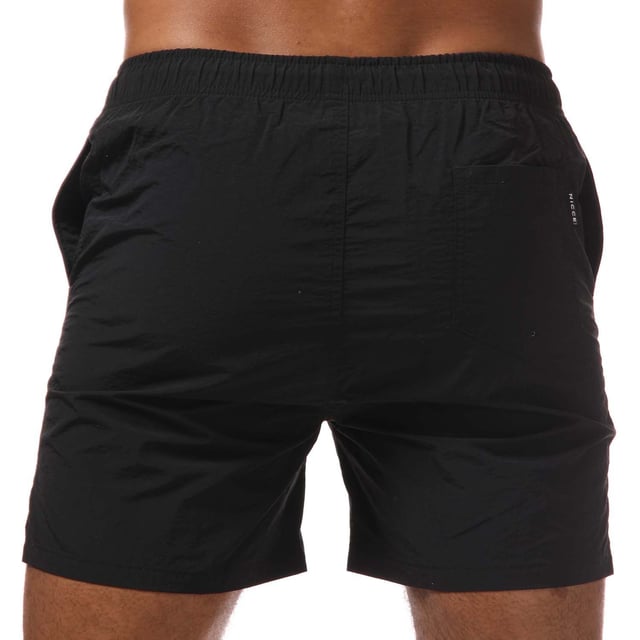 Mens NICCE Plinth Swim Shorts in black.- Elasticated drawstring waist.- Two open front pockets. - Single back pocket.- Mesh inner briefs.- Logo to leg.- Flat hem.- Regular fit.- Shell: 100% Nylon. Lining: 100% Polyester.- Ref: 1059W0050001