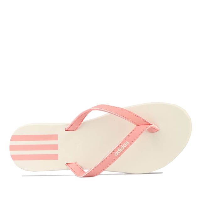 Women's adidas Eezay Flip Flops in Pink white Womens adidas Eezay Flip Flops in glow pink - cloud white.- Slip-on design.- Slim straps with toe thong.- Lightweight EVA midsole and outsole.- adidas linear branding to strap.- 3-Stripes branding on footbed.- Synthetic upper Synthetic lining Synthetic sole.- Ref: EG2035
