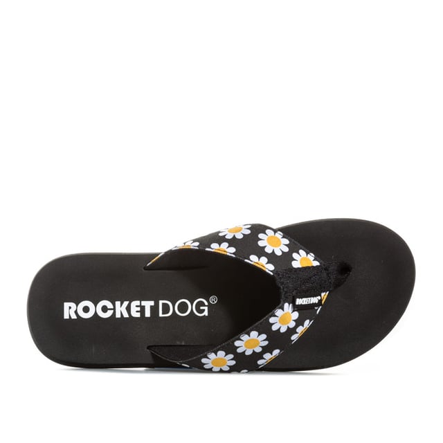 Sandalias negras Rocket Dog Adios Daisy para mujer, confeccionadas en textil y suela de goma. Presentan diseño de margaritas, tira para la puntera y la marca Rocket Dog.