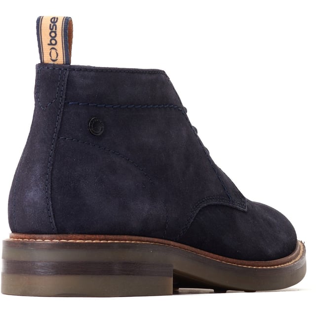 Stride in style with the Knebworth Men's Chukka Boot by Base London. Boasting premium leather uppers, a laid-back 3-lace closure, and a robust nylon pull tab for easy on/off, this Chukka boot features an Orthorlite insole for added comfort.
