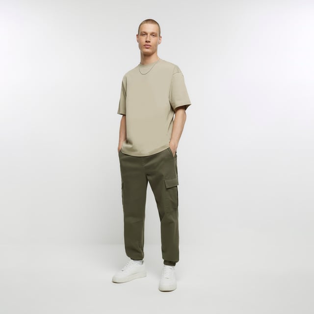Slim fit, Utility pockets, Cuffed hem, Elasticated waist, Our model wears a UK 32 regular and is 186.5cm/6'1.5'' tall, Cotton for this product has been responsibly sourced, Cool Iron, Do Not Bleach, Do Not Dry Clean, Do Not Tumble Dry, Machine Wash 30C Gentle