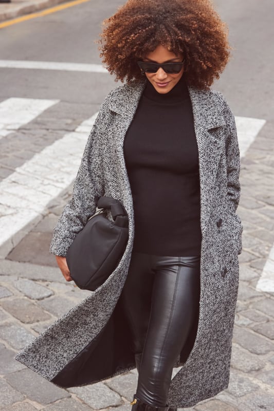 Wrap up in styleWear-forever double-breasted styleTimeless herringbone fabricStatement turn-back cuffsLongline hem to keep out the chillYou'll wear it everywhere