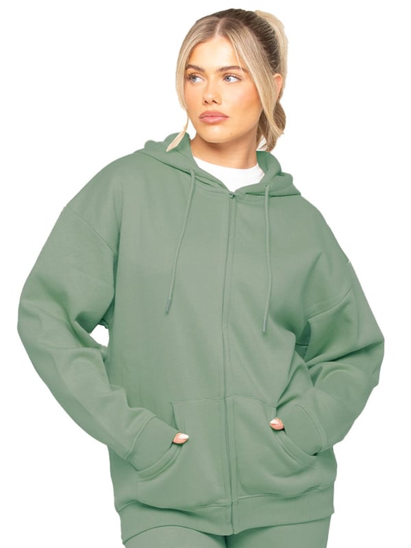 The Enzo Women's Zipped Hoodie boasts an oversized fit with a convenient zip-up design and adjustable drawstring hoodie. The cuffed wrists and brushed back inner fleece ensure maximum comfort, making it the perfect choice for casual wea