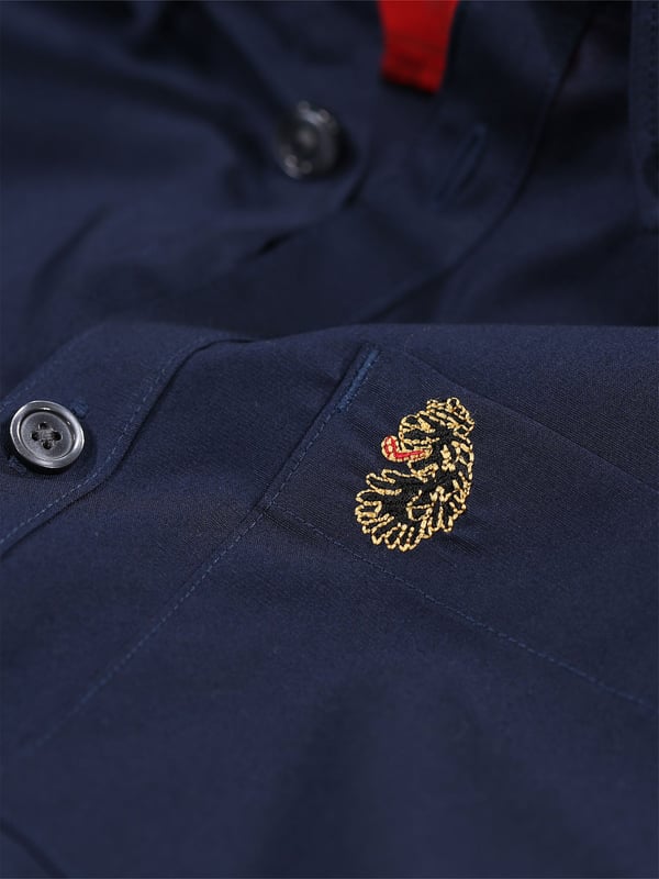 This classic LUKE long sleeved shirt is an essential item for your wardrobe, classically styled with a buttoned-down collar and a simple chest patch pocket. It is detailed with imitation river shell plastic buttons on the central front placket, running from hem to collar and is completed with the brand's iconic lion head embroidery on the left chest. Tailored fit. Iconic LUKE BLACK, GOLD, RED lion head embroidery. Iconic LUKE tri-colour trim tape. Left chest pocket detail-Imitation river shell plastic buttons. Central front placket. Button down collar detail at front and central at back. Back yoke detail and external back box pleat. Long sleeve with buttoned cuff.