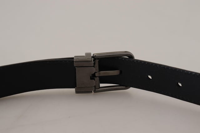 Brand new with tags
  100% Authentic Dolce & Gabbana belt
  Made from Quality leather
  Metal buckle closure
  Unique eye-catching design
  Dark blue color
  Width: 2.5cm
  Made in Italy
  Tag size: 90cm / 36in
  Perfect for men