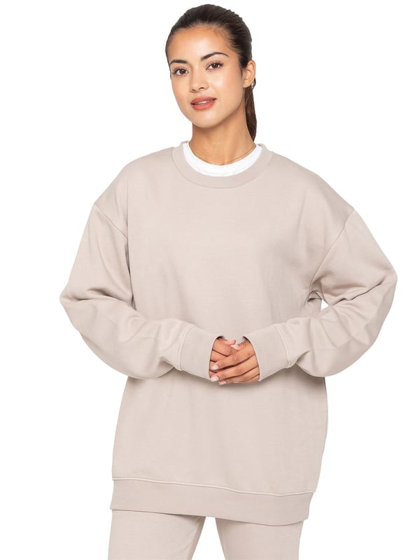 Enzo Women’s Oversized Sweatshirt and Relaxed Fit Joggers. Fashioned in Pure Fabric for Softness and Comfort. Joggers Feature 2 Side Slash Pockets. Brushed Back Inner Fleece Lining. Cuffed Leg Design. Elasticated Waist with drawstrings. Ideal to use for Casual and Work wear.