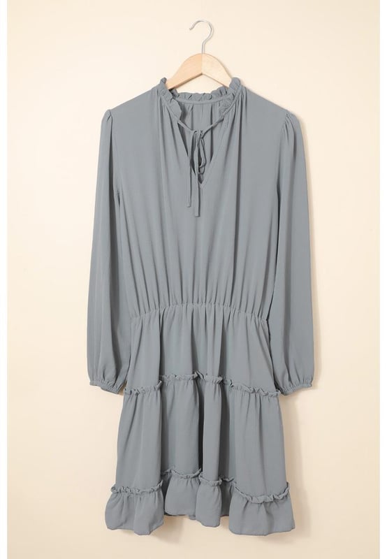 Stylish and feminine V Neck Long Sleeve Ruffle Tiered Mini Dress
  Flattering v-neckline
  Long sleeves for coverage
  Ruffle tiered design adds a playful and romantic element
  Suitable for both daytime and evening occasions
  Made with Quality materials
  Comfortable and stylish
  Perfect when paired with heels and statement accessories