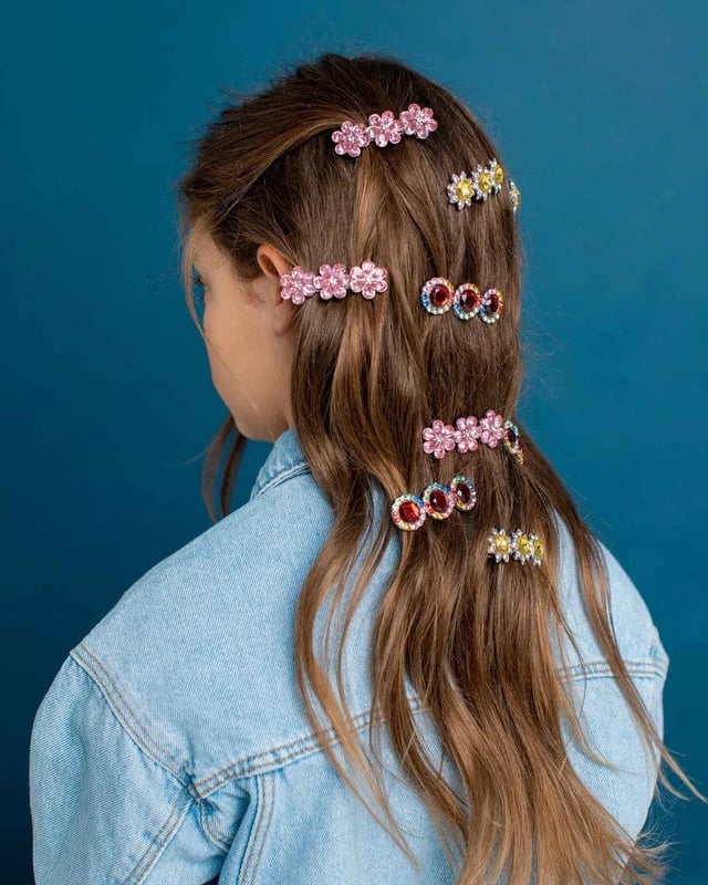 Face the music and dance with this Ballet Recital Gem Hair Barrette Set from Super Smalls. They might not help with fancy footwork, but this set of multi-coloured, gem-covered hair pieces will add shine and sparkle to twirls and steps, all whilst keeping hair where it's meant to be. Mix it up or wear together for a show-stopping look. 3 Hair Barrettes Reusable Presentation Box Not Suitable for Children Under 3