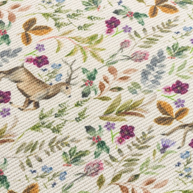 A wonderfully festive set of four placemats which features charming Reindeers who stand proudly amongst the vivid seasonal florals. Digitally printed for exceptional clarity on a durable woven polyester fabric, these beautifully designed table placemats will instantly transform your Christmas dining table.