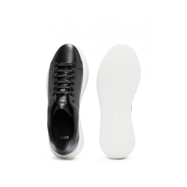 Polished-leather trainers by BOSS, made in Portugal and featuring a lace-up closure and branded rubber sole.
LacesFully linedPackaging: Box
100% Cow skin, 100% Polyester, Sole: 100% Rubber, Upper material: 100% Cow skin, Innersole: 100% Goat leather
&nbsp;
50497887
&nbsp;
&nbsp;
