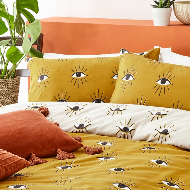 Add instant personality into your bedroom with this bold duvet set, featuring mystical watching eyes design. This has a neutral reversible design so you can switch the look when you need to.