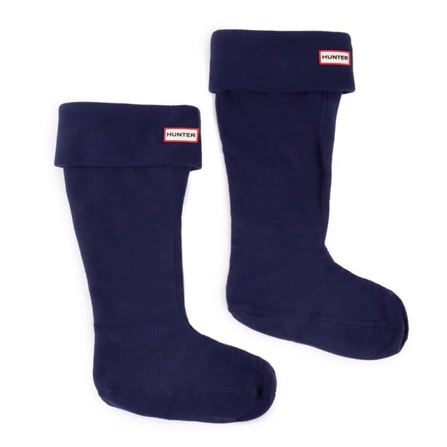 Calcetines de agua Hunter altos polares para mujer en color azul, fabricados con poliéster. Incluye: marca Hunter, cuerpo de tejido polar, talla mediana para tallas británicas 3-5 y grande para tallas británicas 6-8.