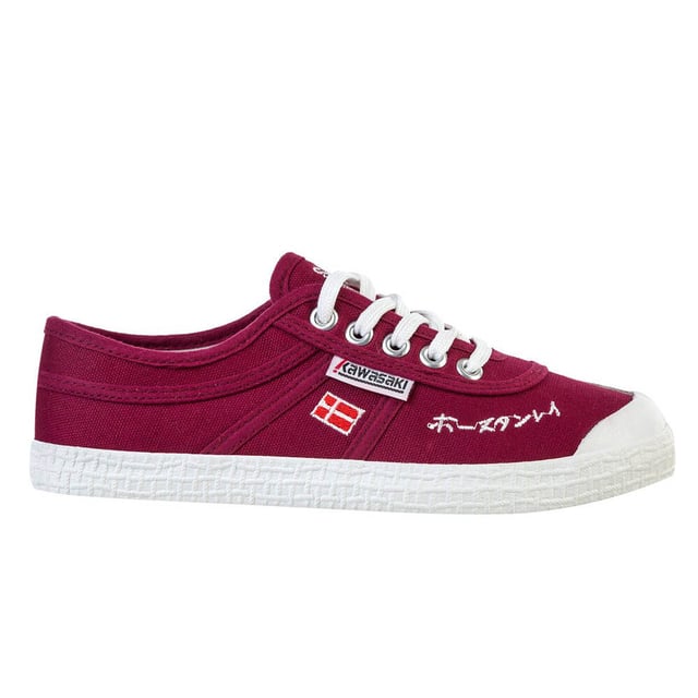 Nuestra zapatilla de lona Signature juega un papel importante en la historia de Kawasaki, y las zapatillas Signature están firmadas en japonés por Bo Stanley, el fundador de Kawasaki. Con un diseño clásico y un ajuste perfecto, ¡estás listo para salir a la calle!. Detalles del producto. Cordones regulables para un ajuste adecuado. Disponible en cuatro colores diferentes. Unisex. Zapato ligero. El zapato de cordones de corte bajo permite la rotación y la flexibilidad. Parte superior: lona y ante de vaca. Suela: RBGuía de tallas/ajuste. Si estás entre dos tallas, te recomendamos que elijas la más grande.Guía de lavado. Se recomienda no lavar el zapato.