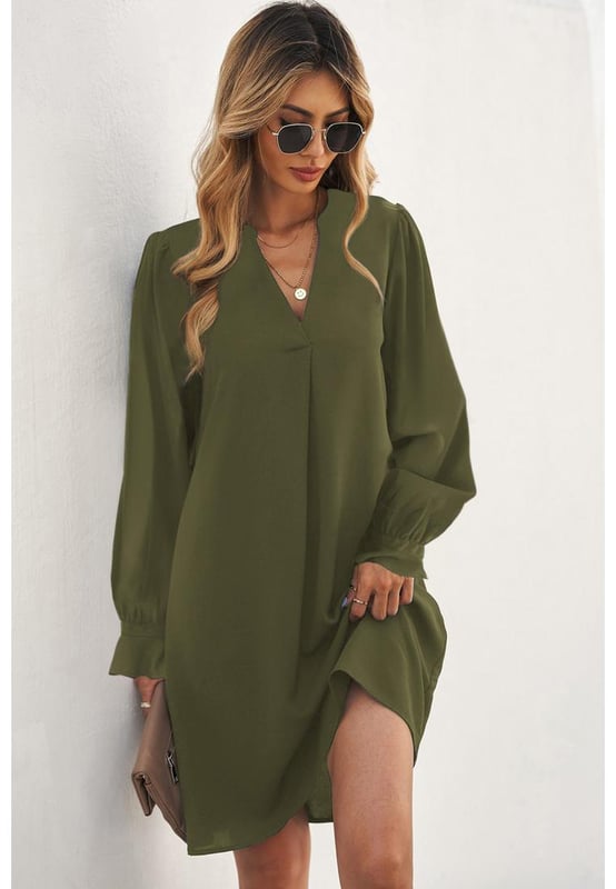 Luxurious and stylish Split V Neck Ruffled Sleeves Shirt Dress
  Split V neck design adds elegance and sophistication
  Ruffled sleeves for a feminine and playful touch
  Suitable for both casual and formal occasions
  Made from Quality materials for comfort
  Flattering fit
  Available in a range of sizes
  A stunning addition to any womans wardrobe