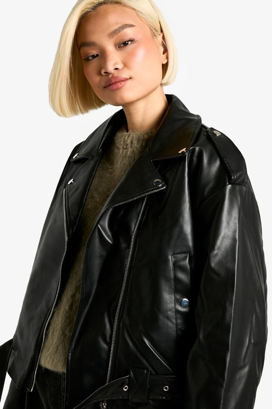 A short, close-fitting jacket complete with zips and stud detailing, rock some seriously cool vibes on the day-to-day with a biker jacket. Whether you prefer cropped, longline or a classic oversized shape for vintage vibes, biker jackets are a wardrobe classic that's perfect for edging up your outfit. Layer up your dress with a suede biker jacket, or show off your shape with a black biker jacket that's both timeless and flattering.Style: Biker JacketFabric: Faux LeatherSleeve Length: Long Sleeve