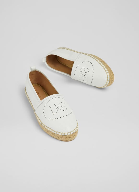 A playful take on the classic flat espadrille, Alexa is a fun everyday summer shoe. Crafted in Spain from super-soft white grainy leather, these round toe espadrilles, have pull-on back tabs, LKB perforation detail to the top of the foot and a woven espadrille sole. Wear them with cotton dresses when the sun shines.
