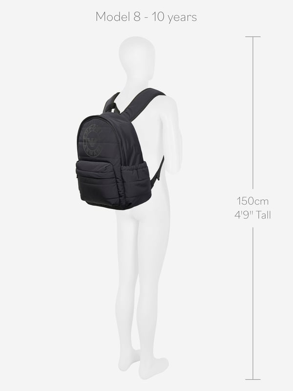 Elevate your young one's style with the Emporio Armani Boys Logo Backpack in Navy (37cm). Crafted for the AW2024 season, this chic piece blends functionality with high-end fashion aesthetics. Perfect for school or weekend adventures, here's why it's essential:‚ Iconic Armani Logo: Features the esteemed Emporio Armani logo, synonymous with luxury and quality.  ‚ Premium Navy Blue Fabric: High-quality material ensures durability and longevity.  ‚ Ergonomic Design: Adjustable straps and lightweight structure offer comfort and support for all-day wear.  ‚ Versatile &amp; Stylish: Timeless navy hue complements various outfits, elevating your boy's fashion game.Gift a touch of designer elegance to your young one's essentials. Get the Emporio Armani Boys Logo Backpack today!