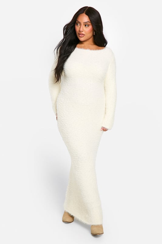 A longline style that lengthens your silhouette and skims your curves for a super flattering look, create the fit you've been dreaming of this season with this plus size maxi dress. A versatile piece you can dress up with heels or keep casual with sliders, plus size long dresses are a wardrobe saviour when you don't know what to wear. Updated for the new season with floral prints, as well as some jersey pieces to keep your lounge style on lock, invest in a plus size floor length dress (it will look good on you).Style: Knitted DressFabric: AcrylicLength: MaxiSleeve Length: Long Sleeve
