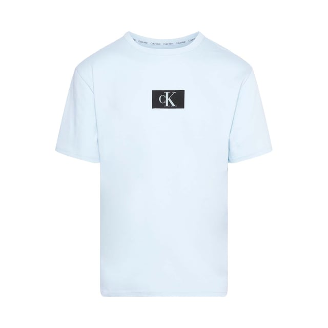 Mens Calvin Klein Lounge T- Shirt in blue.- Crewneck.- Short sleeves.- Signature tape inside the collar.- Iconic Calvin Klein monogram logo on the chest.- Regular fit.- Ref: 000NM2399ECAV