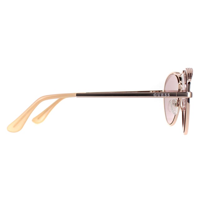 Guess Aviator Womens Shiny Rose Gold Bordeaux Mirror GF0350  Sunglasses are a stylish, aviator frame, that exude timeless glamour while providing optimal coverage and sun protection. Crafted from lightweight metal , these sunglasses ensure durability and comfort, making them ideal for any occasion.