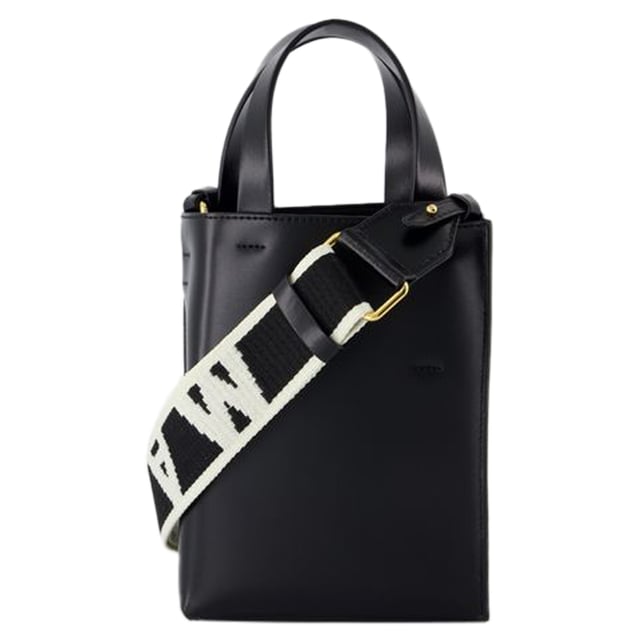 Fit: true to size - Sizing: European. Closure: open top. Interior: two compartments and two zipped pockets.