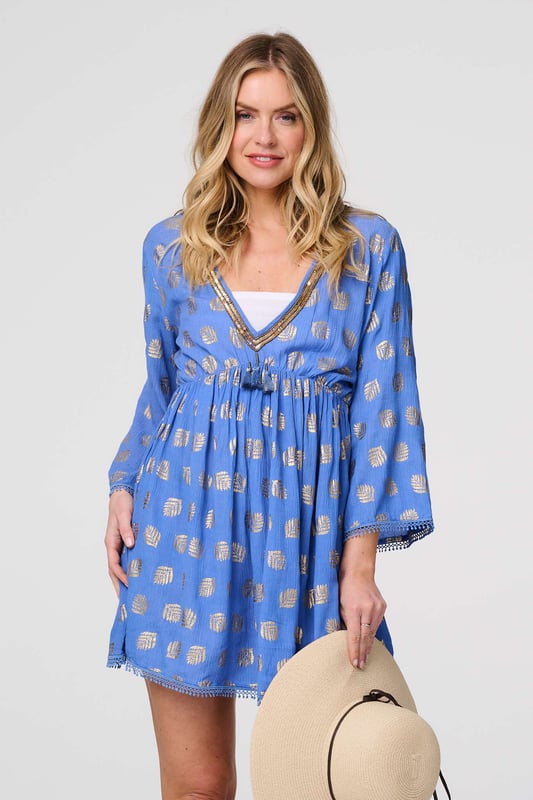 Looking for something to throw over your swimming costume at the beach? This dress is just the thing. It's made from viscose that will stay breathable and comfortable even on hot days. It has wide kimono sleeves, a v-neck and a tassel detail empire waist. Whether you style it casually with flip-flops by the pool or your favourite trainers on a holiday walk, you're sure to look and feel cool.