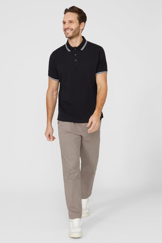 Introducing our Pique Tipped Polo, the perfect addition to any man's smart casual wardrobe. Crafted with meticulous attention to detail, this polo offers a sophisticated and polished look. The pique fabric provides a comfortable and breathable feel, making it ideal for all-day wear. With its stylish tipped collar and cuffs, this polo adds a touch of elegance to any outfit. Whether you're heading to the office or out for a casual gathering, our Pique Tipped Polo is the ultimate choice for a smart and effortlessly stylish look.