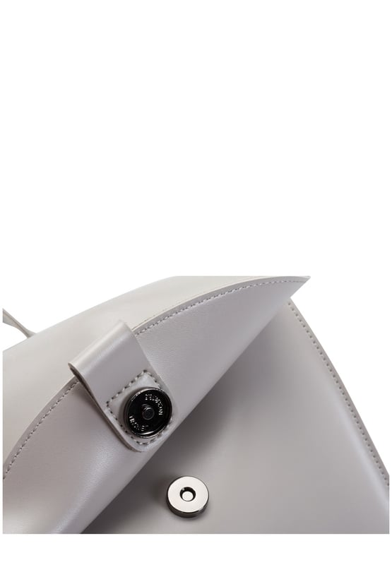 You’ll be ready to take on anything the day holds with our minimalistic backpack uplifting any outfit. This wardrobe staple can be styled up or down from a floral dress to mom jeans, the unique, contemporary shape featuring gun metal buckle detailing and our debossed logo creates a chic and unforgettable look. Features: , Claudia Canova blind debossed logo, Flapover front with mag-dot fastening, Grab handle, Two adjustable backpack straps, Gunmetal hardware Style Ref: 84312 GREY