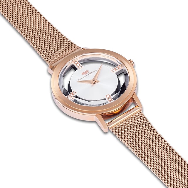 Would you like an eye -catcher on the wrist? Then this women's time meter of Rhodenwald & Sons is the right choice: Reduced functionality in conjunction with an expressive interpretation of the luxurious skeleton mechanism creates a special accessory. A touch of skin shimmers between the bezel and dial, bridged by four striking line indices, decorated with crystals from Swarovski®. The dial with a Sunray effect and subtle Dauphine added player play gently with the light. A stainless steel housing and a stainless steel bracelet in Milanaise-optics-both with a rose gold plating-ensure optimal everyday suitability.