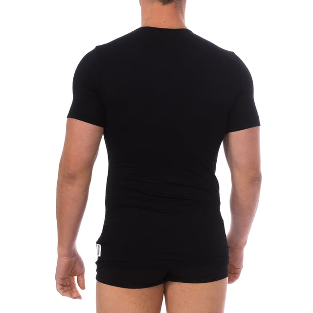 Bikkembergs short sleeve t-shirt.
 Round neckline with ribbed finish.
 Brand logo on the sleeve.
 Comfortable and breathable fabric.
 Seams seen in tone.
 Composition: 95% Viscose, 5% Elastane
 Care:
Wash at maximum temperature 30º.
 -Do not use bleach.
 -Do not dry clean.
 -Allows the use of an iron.