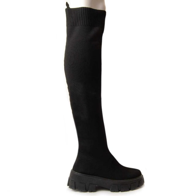 Plateaustiefel für Damen. Bequeme Passform. Hergestellt aus veganen Materialien. Hergestellt von anderen Marken für unsere Marke. Ungefähre Maße: 5 cm Absatz, 3 cm Plateau, 55 cm Schafthöhe und 12 cm Schaftbreite.