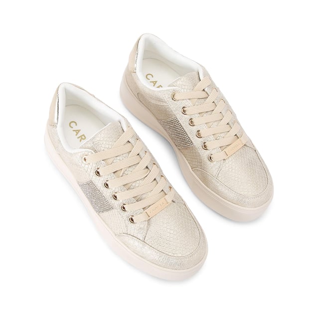 The Jive Lace Up is a flatform trainer in a gold metallic fabric, with croc embossing. There is a metallic gold panel at the heel and features a gold Icon C stud. Sole height: 40mm. This product features 'All Day Long' technology.