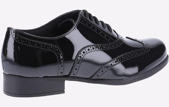 Hush Puppies School Shoe Girls Kada is a smart, classic leather brogue style shoe for that ultimate on trend look. Accompanied with fine brogue detailing and lace up finish, this shoe is sure to last all day wear. Finished off with a glossy patent finish for added style
-Patent leather uppers
-Brogue detailing
-Toe and heel reinforcements
-Low block heel
-Lightweight sole unit
-Approx 27mm Heel Height