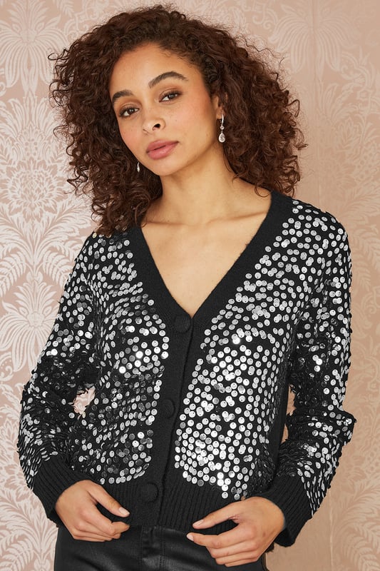 This super cute, cosy and sparkly cardigan is perfect for the upcoming festive season! For party invites, casual dates and styling with jeans this season. With a V neckline, button up design and all over sequinned, designed to shimmer.