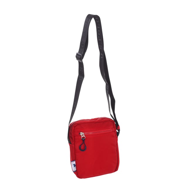 Men's shoulder bag from the U.S. POLO ASSN brand.
 Synthetic material exterior.
 Top zipper closure.
 Zipper pocket on the front and back.
 Back interior: One zipper pocket.
 Adjustable strap with brand print.
 Brand logo on the front.
 Seams seen in tone.
 Measures: 17x20x5.5cm
 Composition: 100% Nylon
 Care:
Clean with a wet cloth.