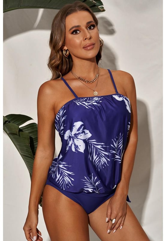 Conjunto de Tankini Sin Tirantes con Patrones Florales Estilosos y de Tendencia  
  Diseño sin tirantes que añade un toque moderno  
  Hermoso patrón floral para un look femenino y juguetón  
  Fabricado con materiales de calidad para mayor comodidad y durabilidad  
  Perfecto para relajarse junto a la piscina o disfrutar de un día en la playa  
  Adición a tu colección de trajes de baño que es a la vez fashionable y versátil  