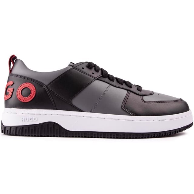 Hugo Kilian Tenn Entrenadores El equilibrio definitivo entre deporte y estilo. Aquí tienes un par de zapatillas deportivas para hombre en negro y gris de HUGO. con un contemporáneo. Aspecto fresco de diseño y vibraciones retro. Esta cómodo. Zapato de moda urbana que presenta la marca distintiva roja y las cualidades de Kilian Tenn.