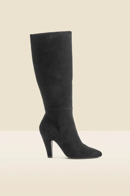 Every wardrobe needs a pair Crafted from butter-soft suede Set on a chunky curved heel for day-to-night comfort Wear-forever knee-high silhouette Slip over skinnies Style with a printed midi dress