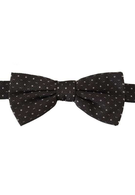 100% Authentic Dolce & Gabbana Silk Bow Tie
  Color: Black and Gray Polka Dot
  Model: Tied
  Material: 100% Silk
  Adjustable length neck strap one size
  Made In Italy
  Width: 6cm
Material: 100% Silk