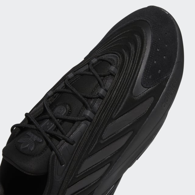 adidas may be a long way from the '90s, but these Ozelia Shoes are rooted in that loud, experimental era. Inspired by the adidas archives, the bold trainers have a chunky build that's all about being noticed. They're sleek with a fast look, and when your days are fast-paced, the Adiprene cushioning helps out on the comfort side of things.This product is made with recycled content as part of adidas' ambition to end plastic waste. 20% of pieces used to make the upper are made with minimum 50% recycled content.  - Snug fit - Lace closure - Textile upper - Hugs the foot - Adiprene cushioning - Rubber outsole - 25% of the components used to make the upper are made with a minimum of 50% recycled content  Shipped by adidas