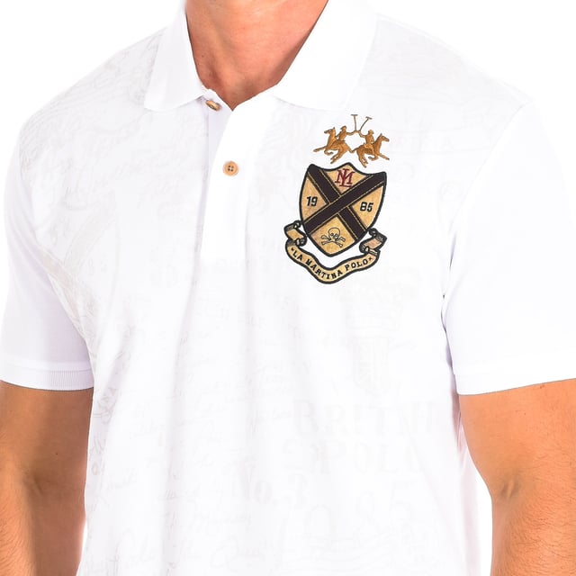 Short Sleeve Polo La Martina.
 White color
 Ideal to complete a casual and modern look.
 Contrasting lapel collar.
 Medium button closure on the front.
 Graphics on the front with motifs of the brand.
 Seams seen in tone.

 Composition: 100% Cotton.

 - Wash maximum at 30ºC.
 - Iron at medium temperature, max. 110ºC.
 - It does not allow the use of a dryer.
 - Do not bleach.
 - Does not admit dry cleaning.
 Composition: 100% cotton.
 Care:
- Wash maximum at 30ºC.
 - Iron at medium temperature, max. 110ºC.
 - It is not allowed to use a dryer.
 - Do not use bleach.
 - Does not support dry cleaning.