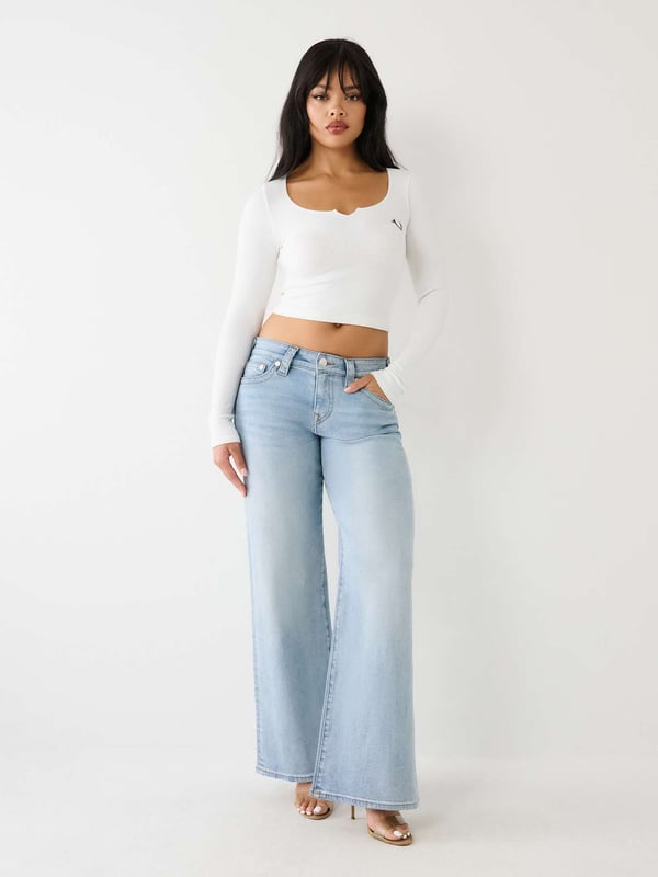 Relax your denim style with the Bobbi Baggy Jean. This relaxed fit women's baggy jean features fading, 3D whiskering, clean hardware, and classic gold stitching. Finished with 1/2" horseshoe detailing along the back pockets.    